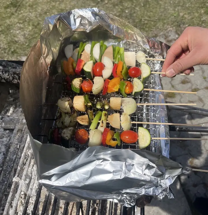 vegetable skewers being BBQed over the Amazon Over Fire Grill Grate mentioned below at Woodbine Park by @betterthenblog